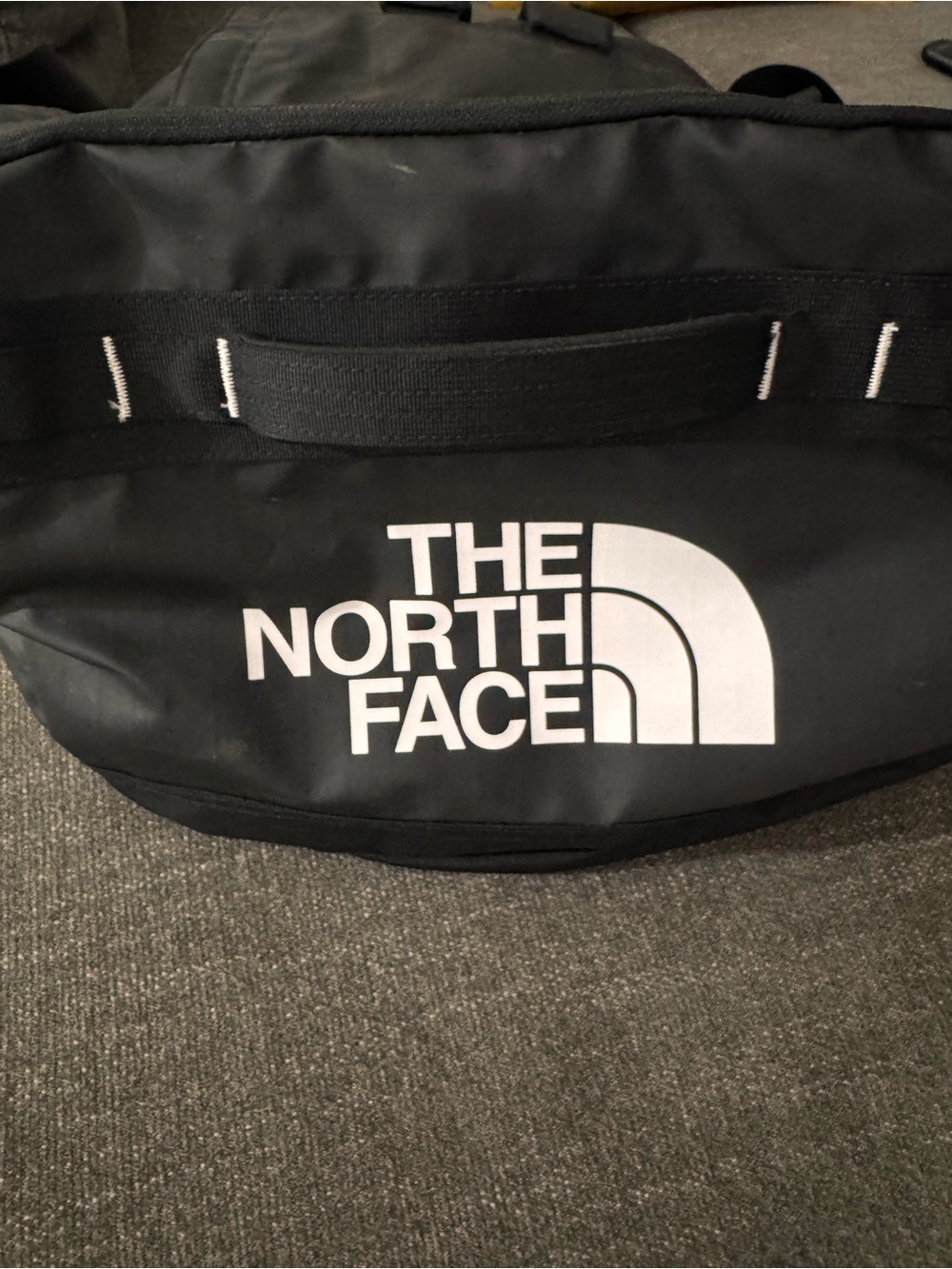 The North Face Black Duffel Bag with White Logo